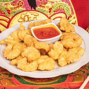 Camarones fritos y apanados con salsa agridulce